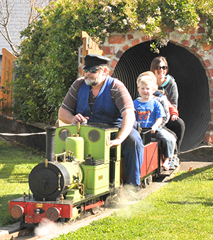 Mini Fell Train Carnival, Featherston,Saturday, train driver Peter Gibbs emerges from the tunnel